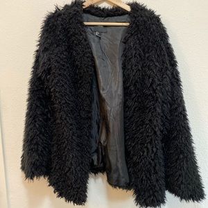 Fluffy black jacket. So cute.